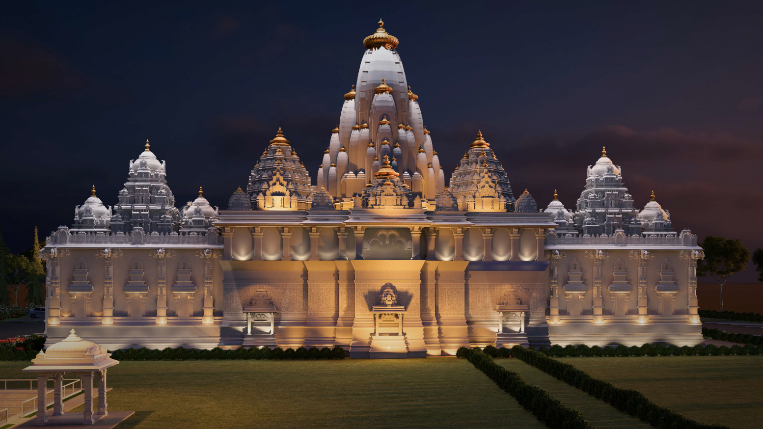 Temple front view at night with golden lighting